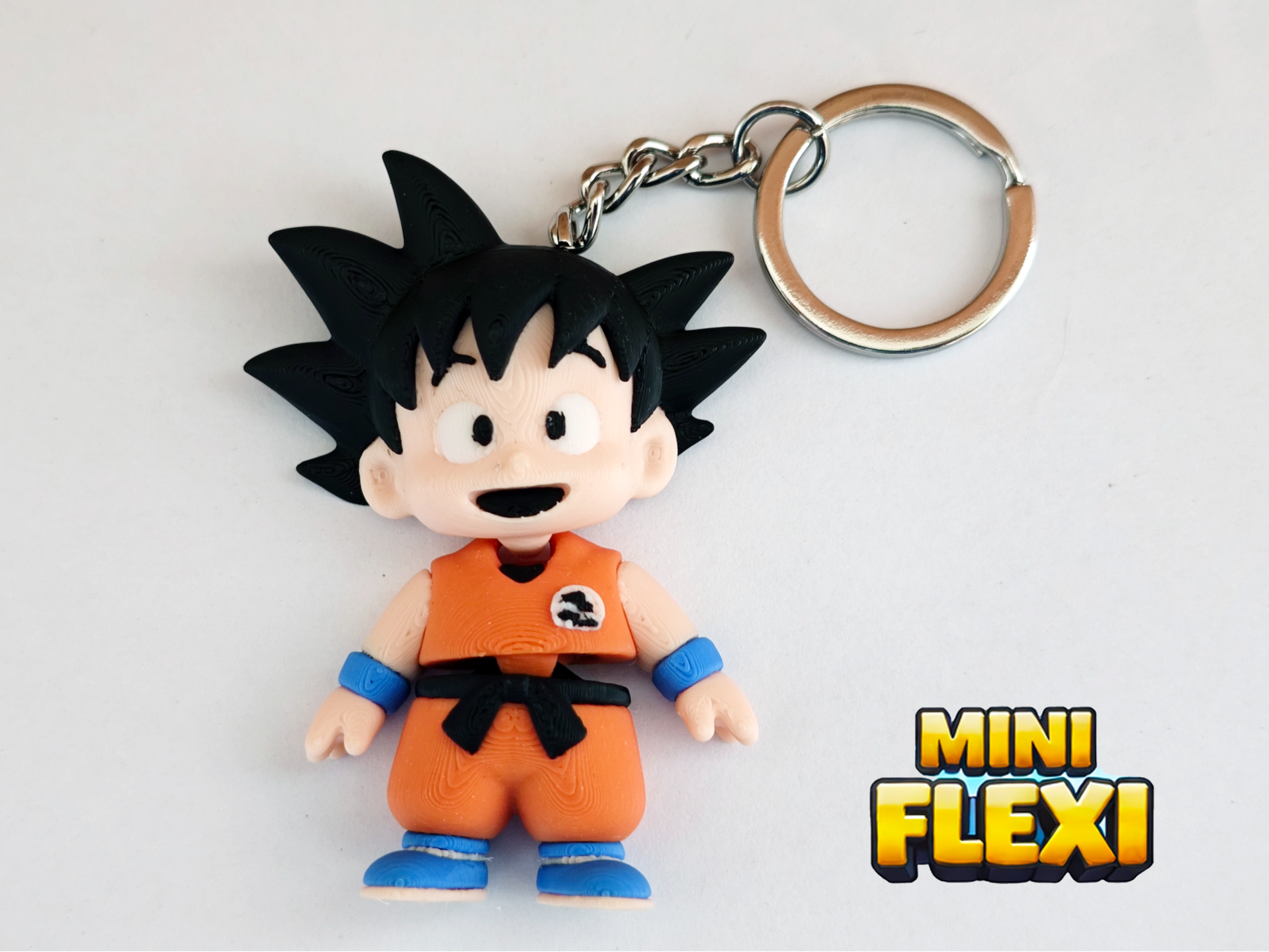 🔑 Llaveros Mini Flexi de Goku – Poder y Aventura en tu Llavero