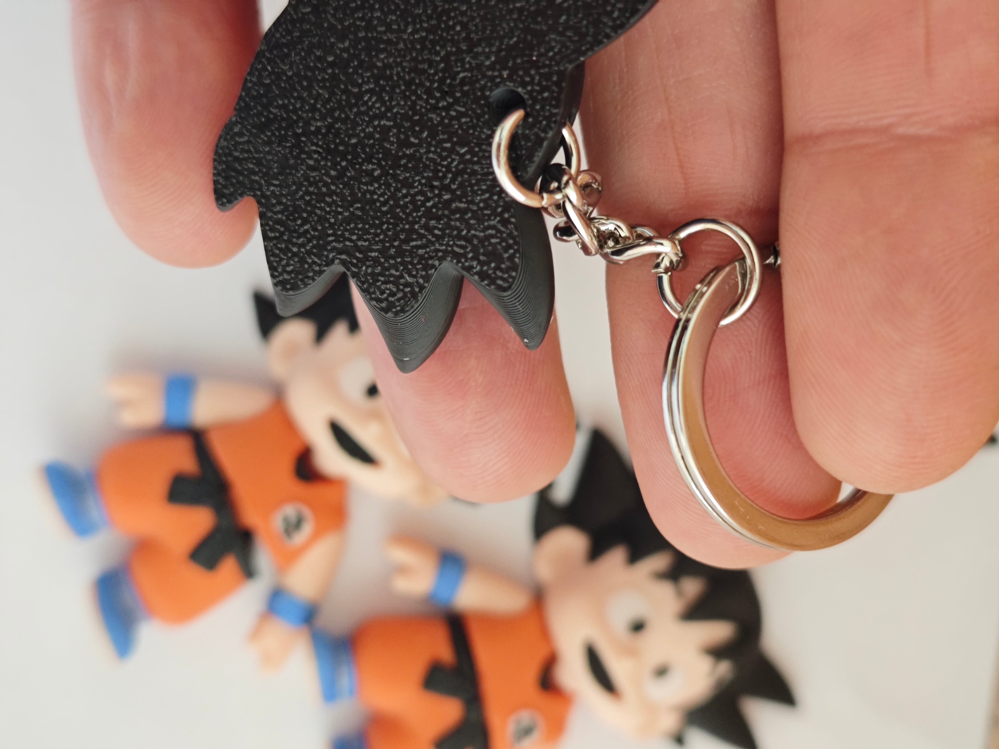 🔑 Llaveros Mini Flexi de Goku – Poder y Aventura en tu Llavero